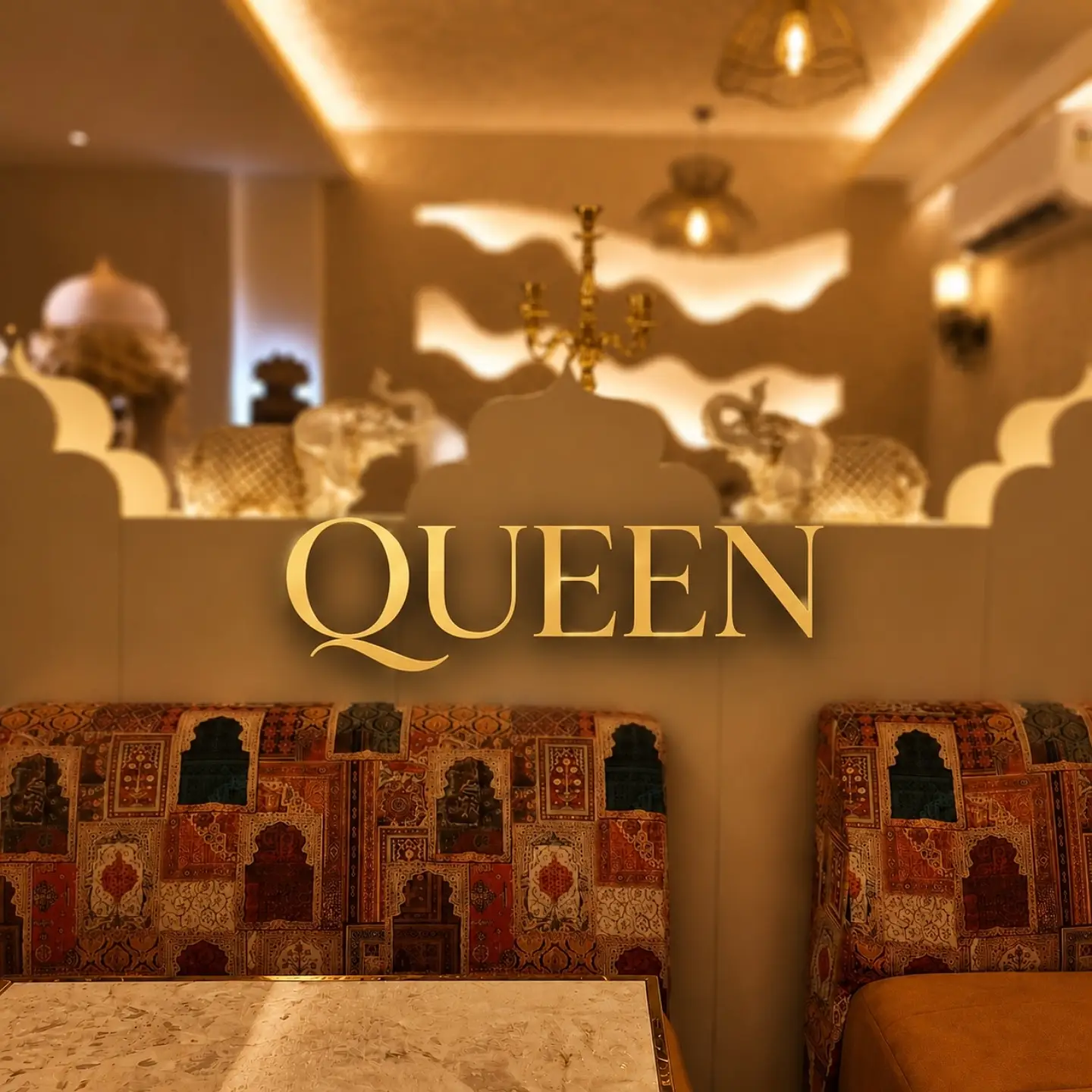 Royal booths under the 'Queen' signage